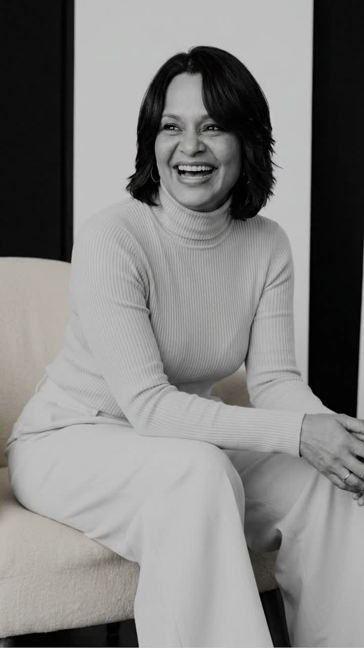 Ivette García, founder of Thrive Mind Body Health, smiling in a black-and-white portrait